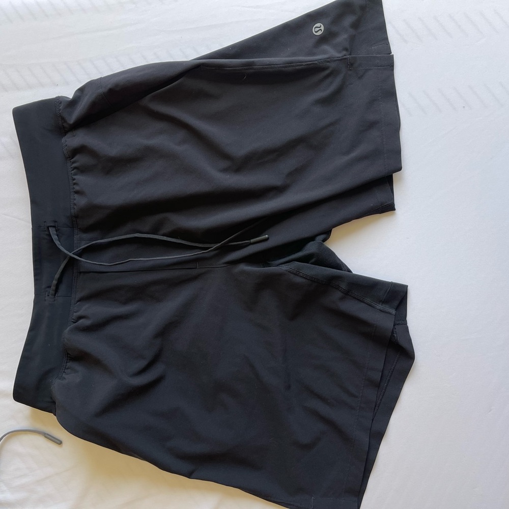 SIZE Medium Lululemon THE short. 7 inch inseam zipper pocket and shirt loop.